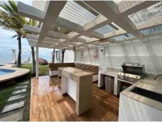 Infinity-style private pool with ocean views, palm trees, at Gorgona beachfront villa