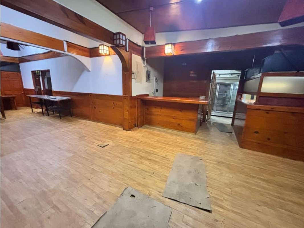 Rustic commercial interior with archways and tile floor Panama City commercial sale
