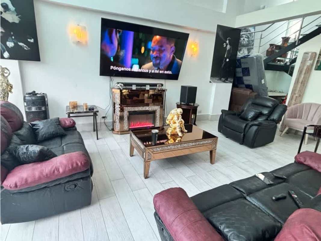 Luxury home entertainment lounge with TV, bar and modern design in Costa Esmeralda Panama