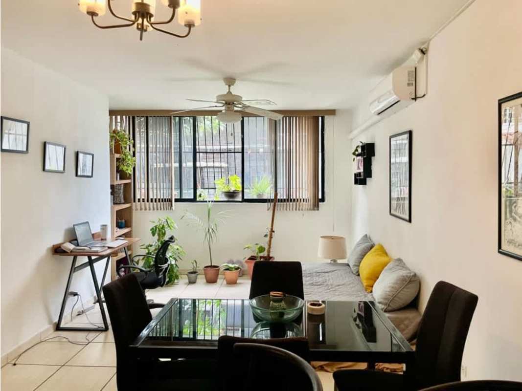 Living room with dining area, balcony access, tile floor PH El Carmen Bella Vista Panama City