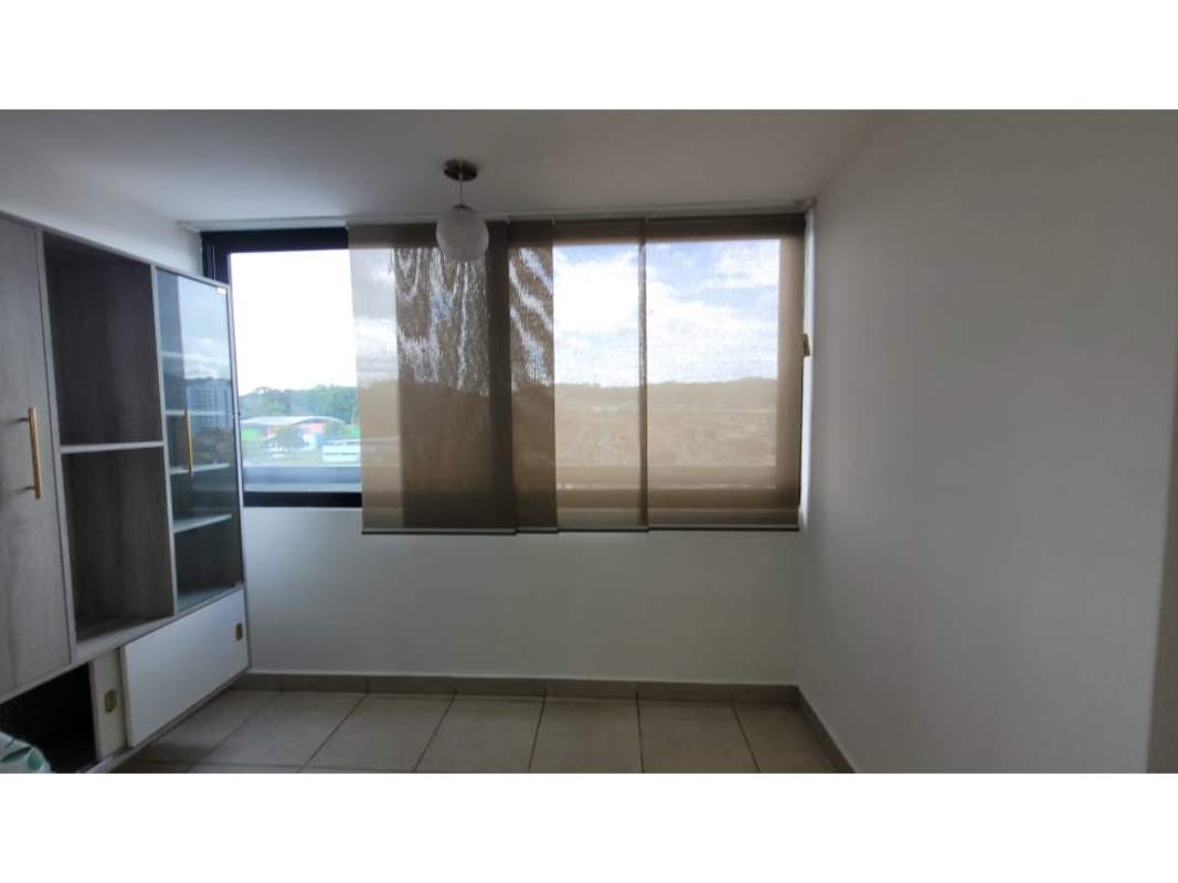 Functional kitchen with granite countertops, cabinetry at Condado Country Club Panama apartment for sale