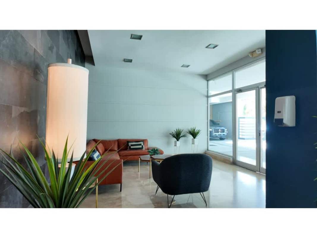 Living dining area with city views, fully furnished in PH Soho Tower Costa del Este Panama