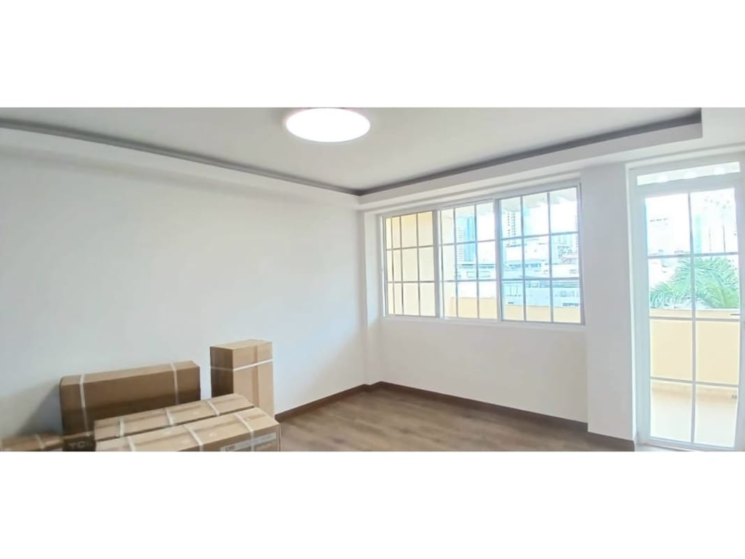 Updated kitchen with granite counters and tiled backsplash Edificio Rattan Vía Argentina