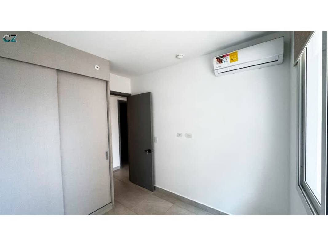 Bright bedroom with split air conditioner, large window and closet PH Van Gogh El Cangrejo Panama