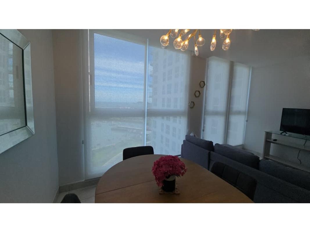 Living dining area with panoramic ocean views and floor to ceiling windows in The Sands Panama City