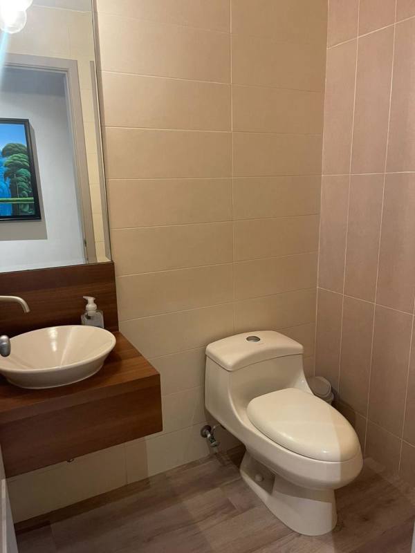 Upscale bathroom with glass shower and granite counter apartment Costa del Este Panama