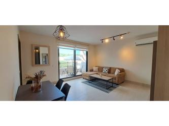 Kitchen with appliances and granite counters in PH River Valley Panama Pacifico
