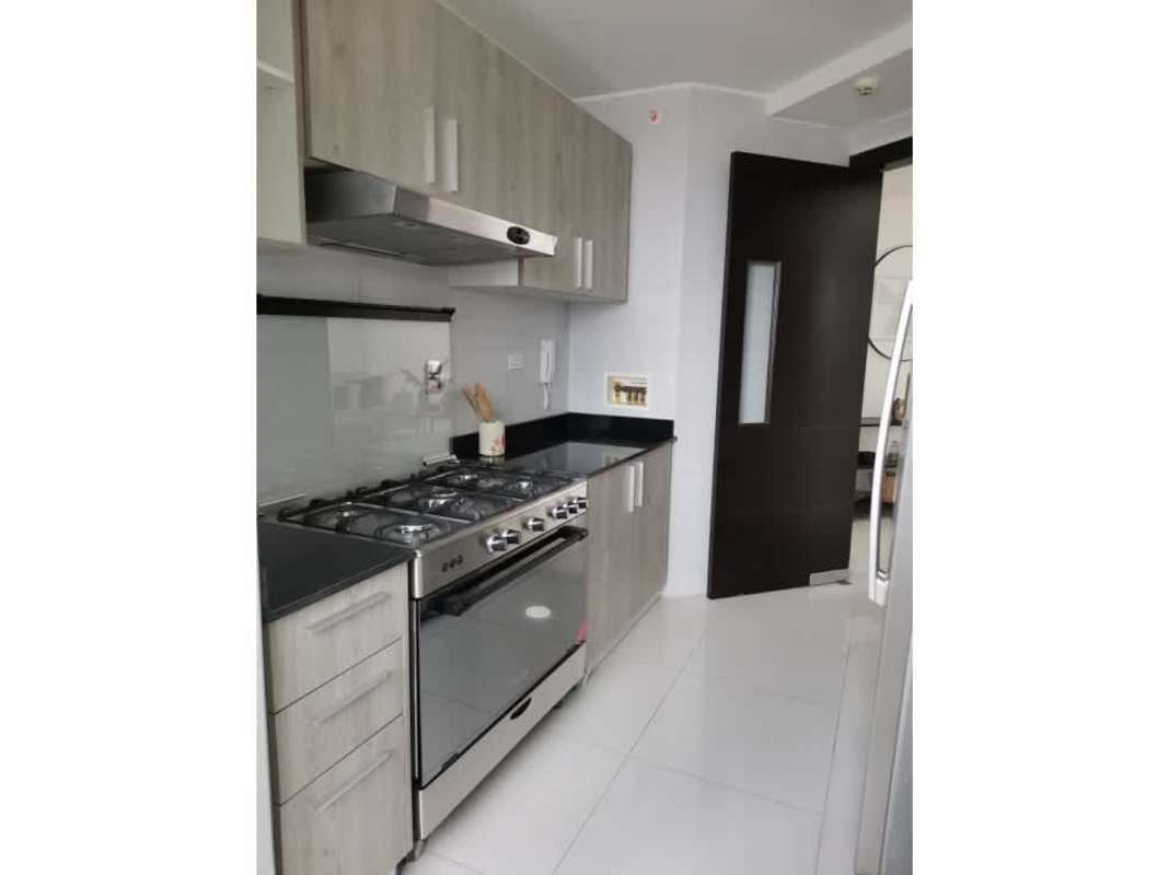 Modern lobby with glass doors, marble floor and concierge desk in Carreras Tower Panama