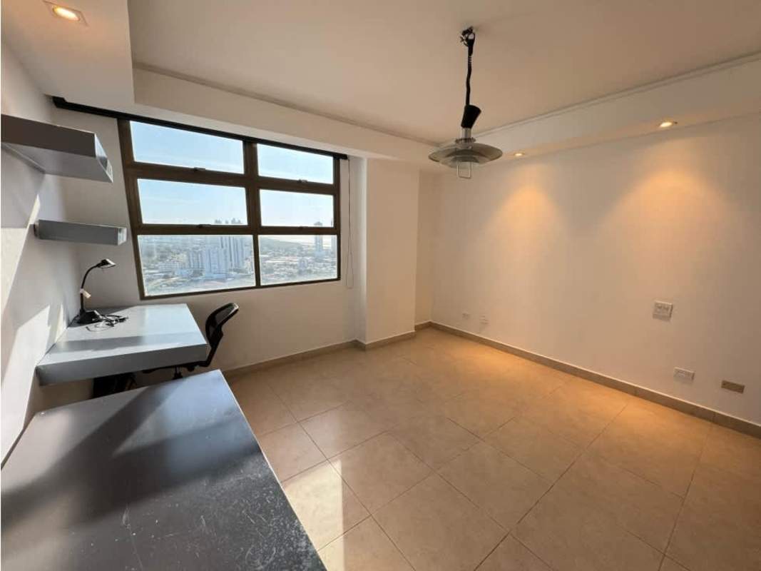 Spacious traditional kitchen with granite island, wood cabinetry and appliances PH Golf Tower Panama