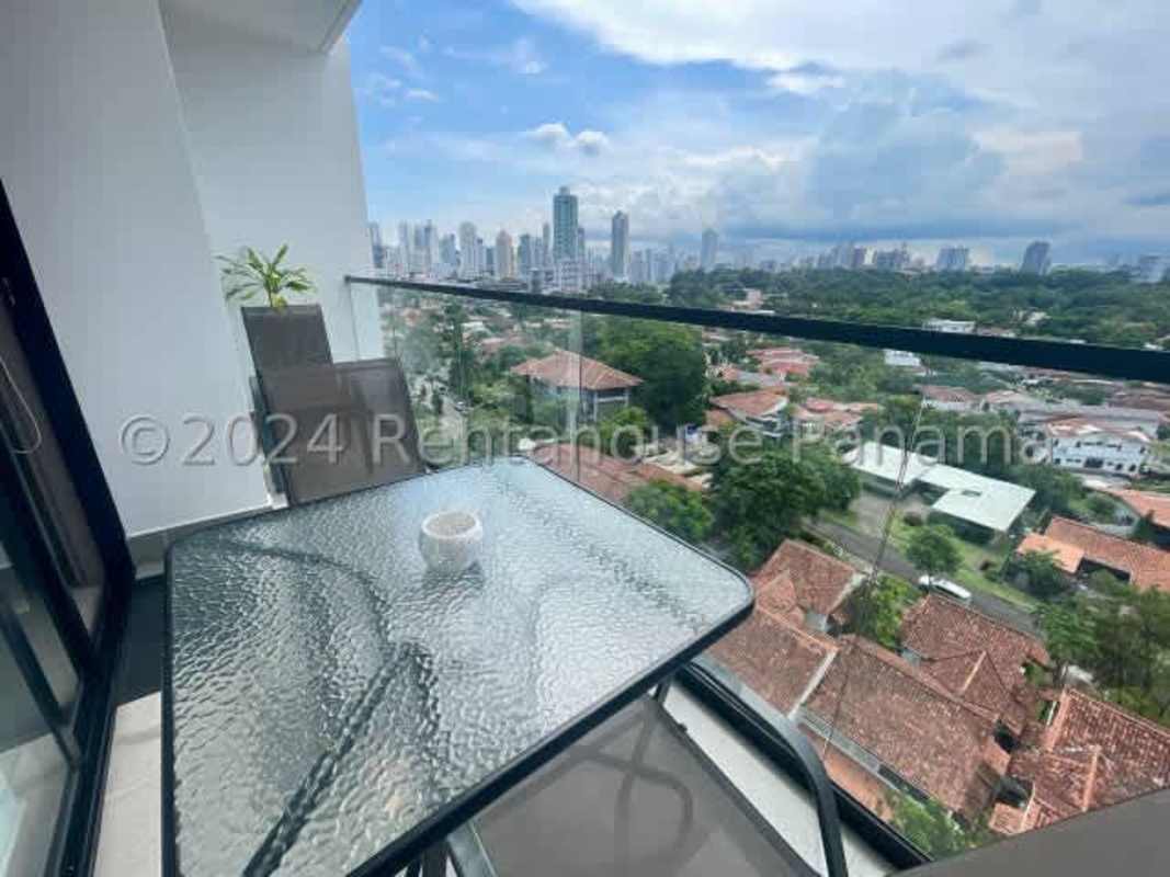 Spacious living and dining with floor-to-ceiling ocean view windows at PH Victory Wellness Panama City