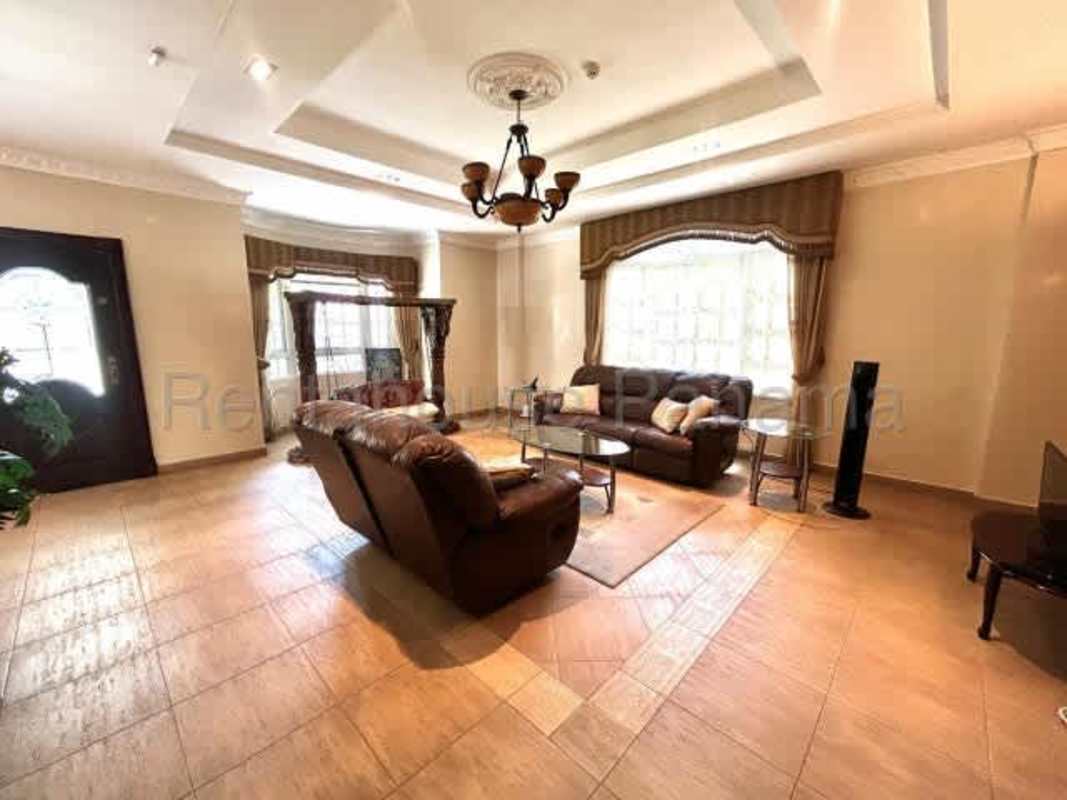Grand foyer with marble floors and ornate staircase in luxury house Llanos de Curundu Albrook Panama