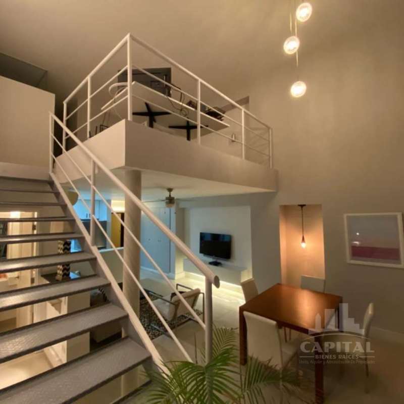 Loft staircase and double-height interior in PH Vitro Loft Bella Vista Panama City