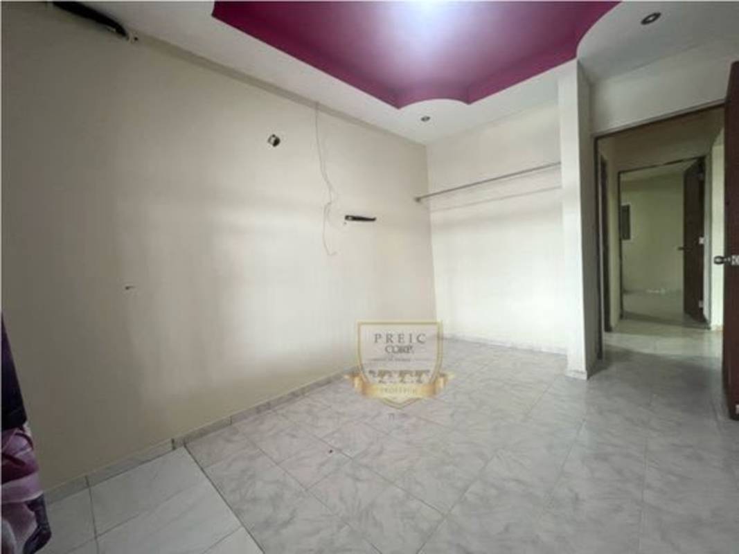 Bedroom with ceramic tiles, accent ceiling paint, minimal design in Tocumen Panama