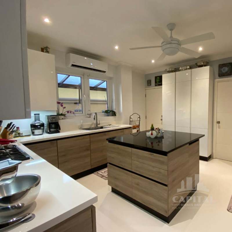 Large bedroom with balcony access, ceiling fan, AC, and contemporary furnishings Rainforest Village