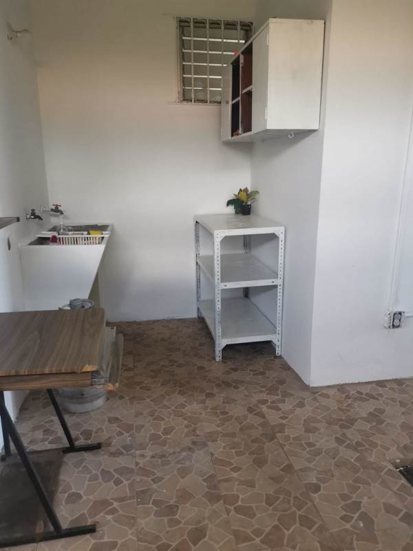 Large living and dining area with tile floors in Vista Alta Villa Lucre Panama