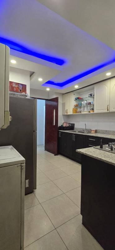 Kitchen with granite countertops, appliances, cabinets in Villa de las Fuentes Betania Panama