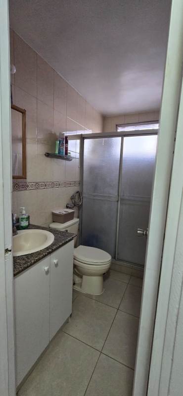 Bright living dining room with tile floors and balcony access in PH Villa Las Fuentes Betania Panama