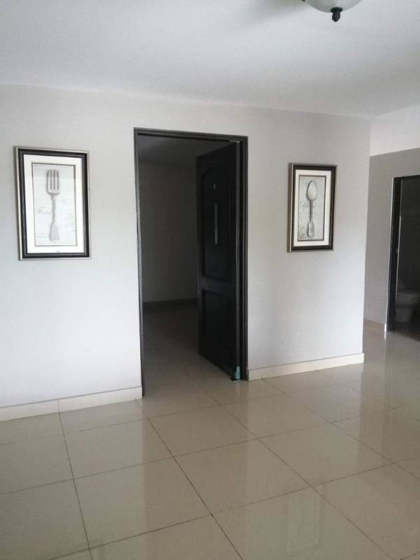 Built-in bar counter with shelving, light tile floor in Panama rental house San Isidro