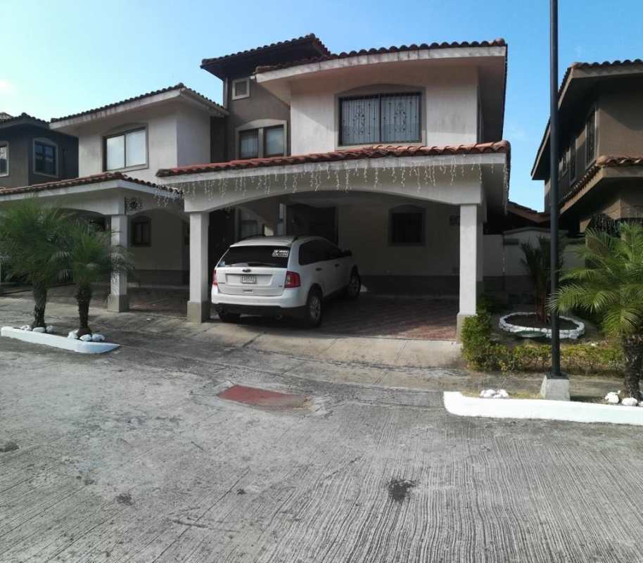Mediterranean styled two-story house with arched garage and tiled roof in San Isidro Milla 8 Panama