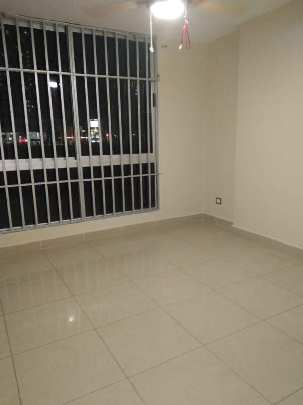 Entrance of PH Rokas with high-rise towers, landscaping and decorative sign in Condado del Rey Panama