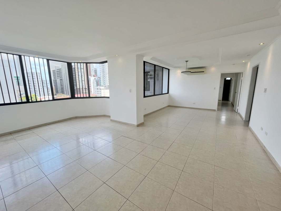 Traditional kitchen with granite countertops, white cabinetry, ample storage at PH Plaza Real San Francisco Panama