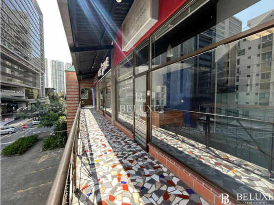 Commercial balcony mosaic tile walkway glass storefront San Francisco Plaza Panama