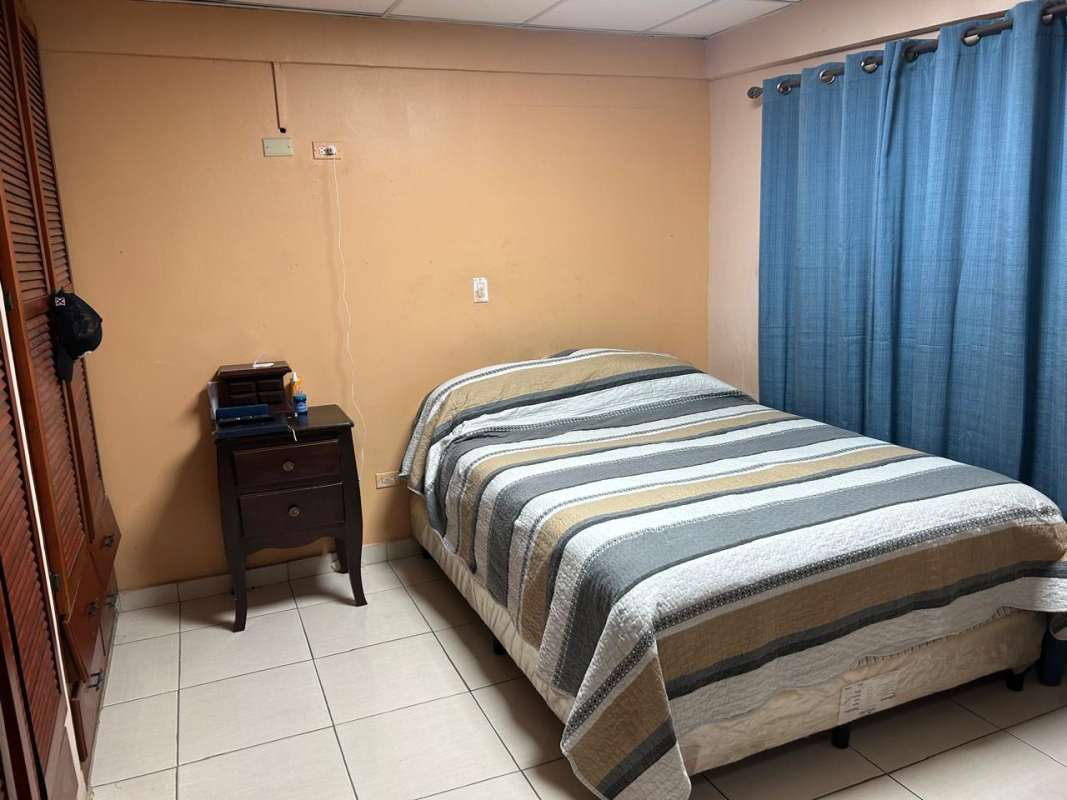 Bedroom with closet blue curtains in Cerro Viento 5-bedroom house Panama