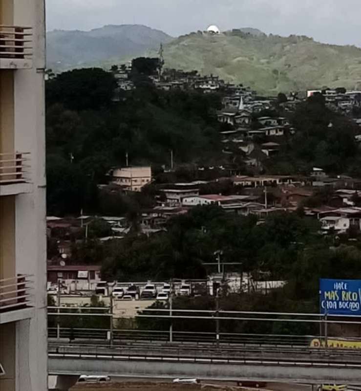 Balcony overlooking urban landscape, main road, and nearby hills PH 4 Islas Via Cincuentenario Panama City