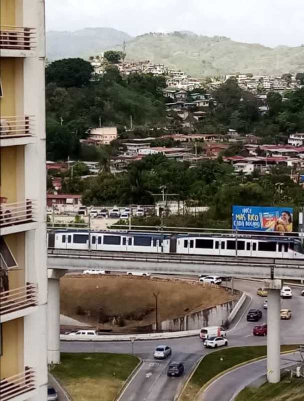 Aerial of building pools, tennis court, and green spaces in PH 4 Islas Via Cincuentenario Panama City