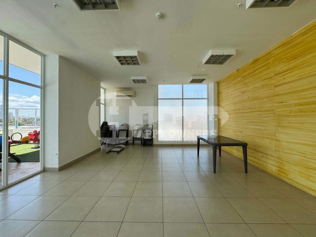 Apartment tower gym with exercise equipment and city views PH Premium San Francisco Panama