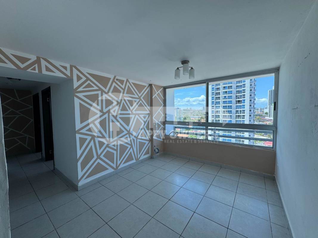 Bedroom with large window split AC unit and city view in PH Premium San Francisco Panama apartment