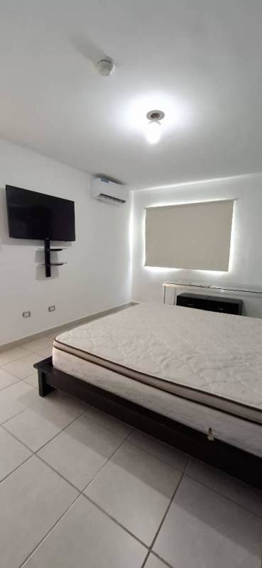 Bedroom minimalist style with large window, AC unit, empty bedframe, PH Victoria