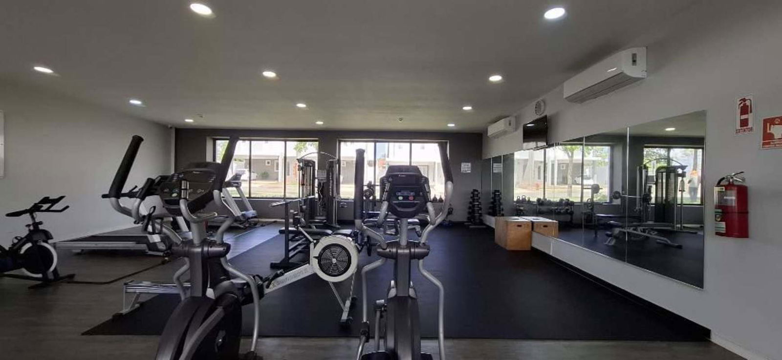Well-equipped gym with cardio machines and weights PH Victoria Panama City