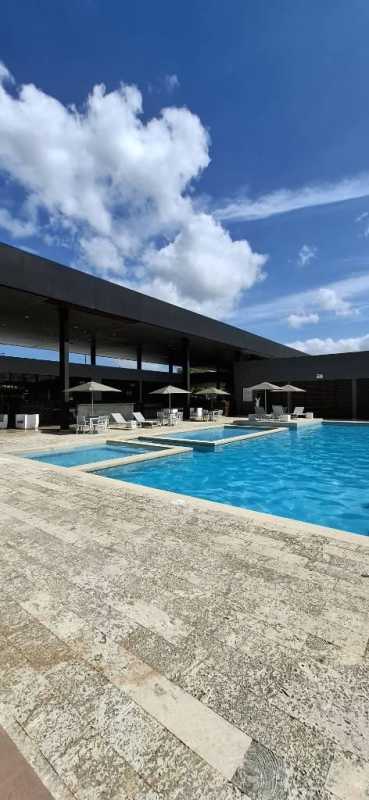 Stairway landing with vertical windows, metal railing, chandelier light PH Victoria house