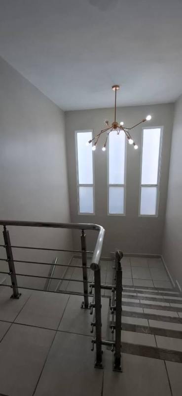 Minimalist master bedroom with TV, air conditioning, bright window inside PH Victoria