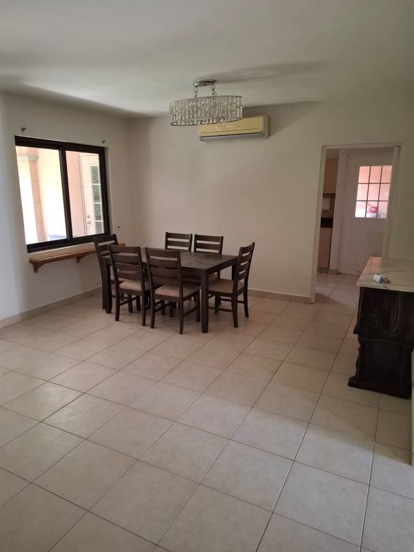 Covered patio with garden and seating area PH Versailles Panama City