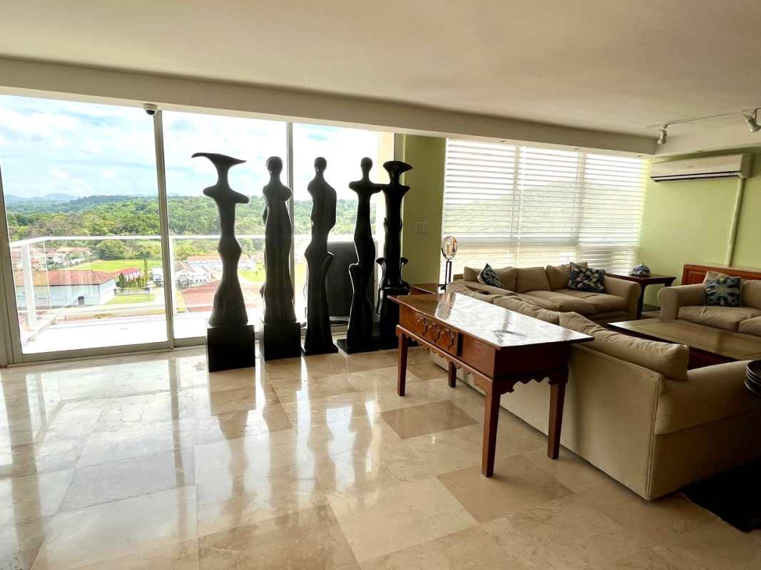 Modern living room with floor to ceiling windows, marble floor, art sculptures in PH Pine Hill Albrook Panama City