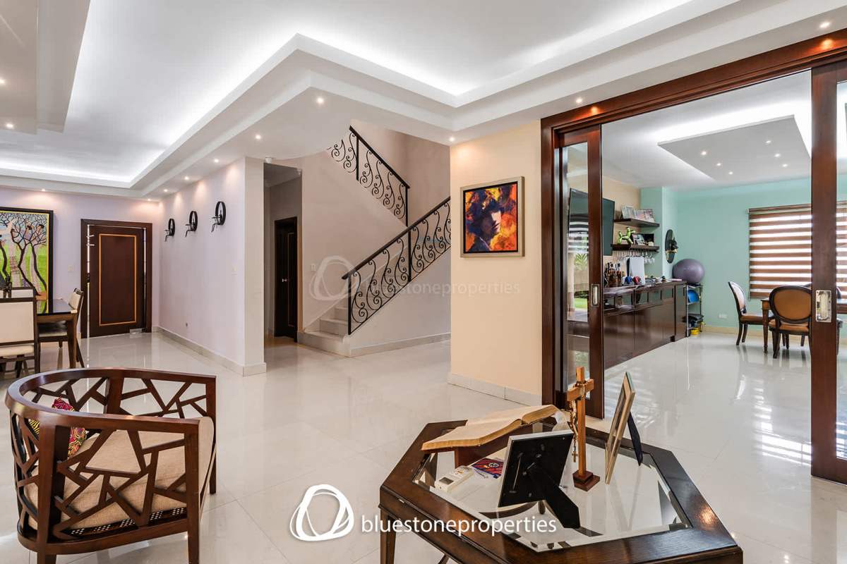 Luxury bedroom with large window and en-suite bathroom in Costa del Este Panama