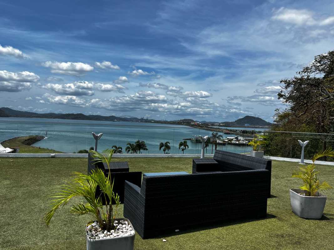 Oceanfront infinity pool sun deck and jacuzzi overlooking Panama Canal entrance at PH Naos Panama City