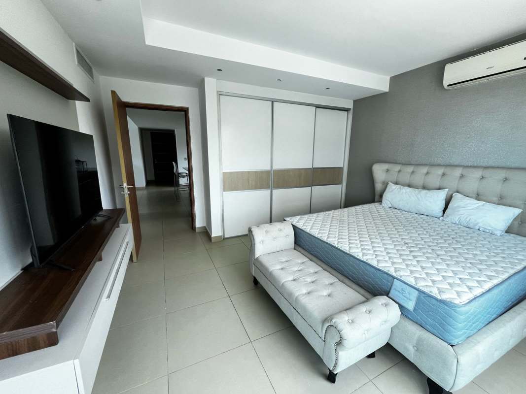 Furnished bedroom with panoramic ocean views split AC wardrobe in PH Naos Amador Causeway Panama