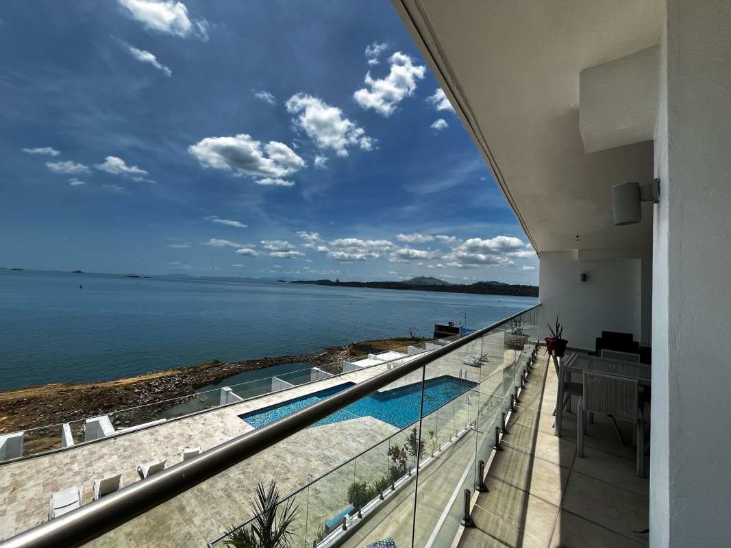 Bright bedroom with large window modern decor split AC wardrobe in PH Naos Amador Causeway Panama