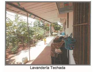 Covered garage paved driveway secure backyard residential house for sale Panama