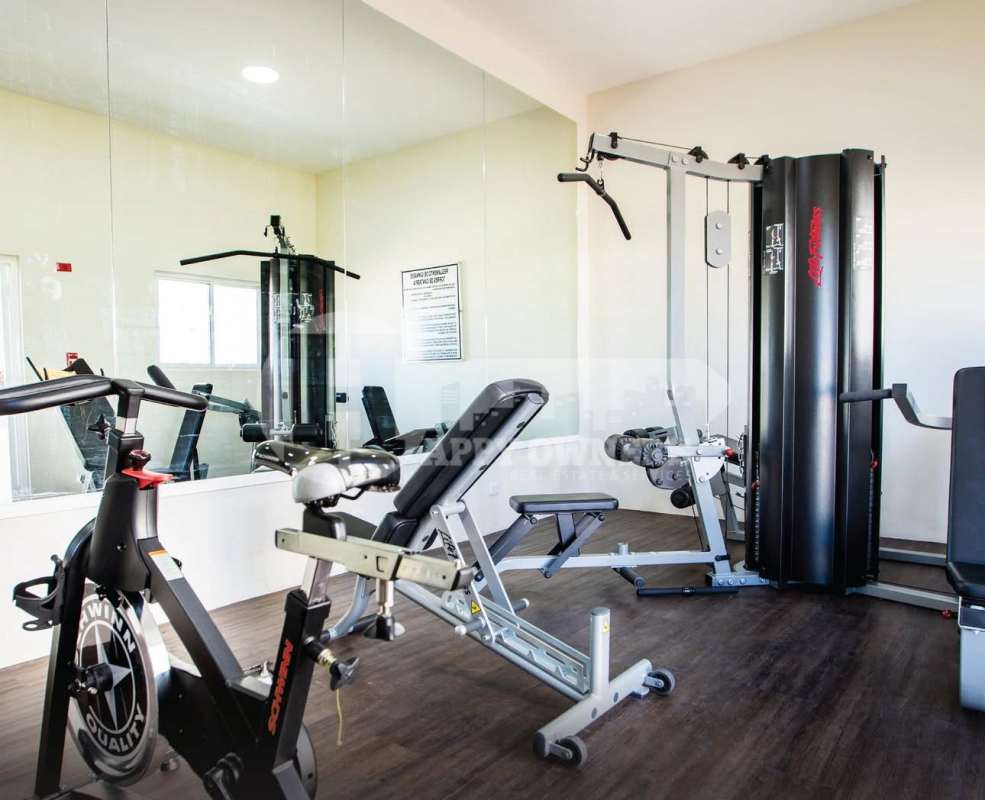 Outdoor pool with lounge deck at Torres de Cantabria Panama City