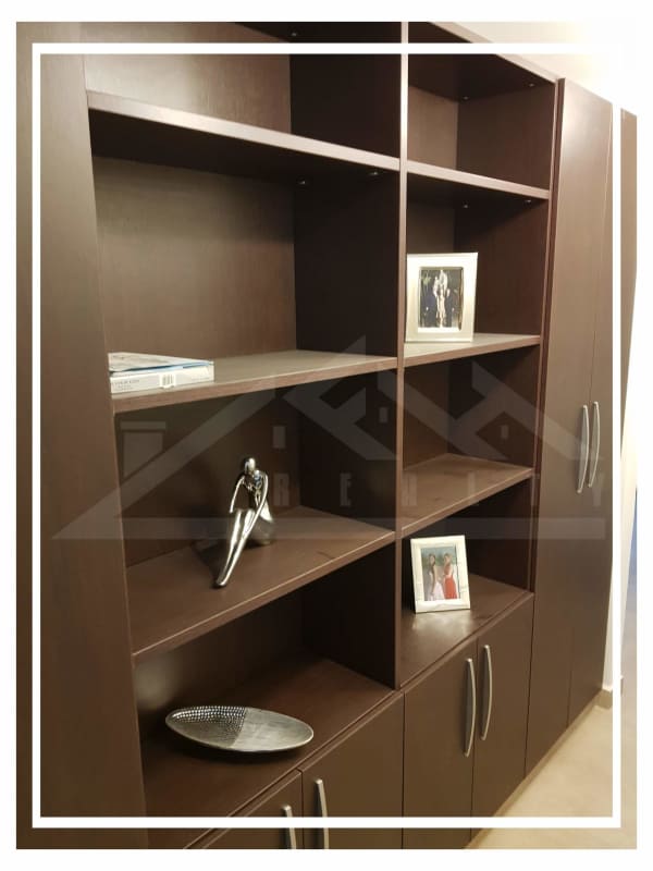 Home office den area with built-in shelves in Embassy Club apartment Clayton Panama