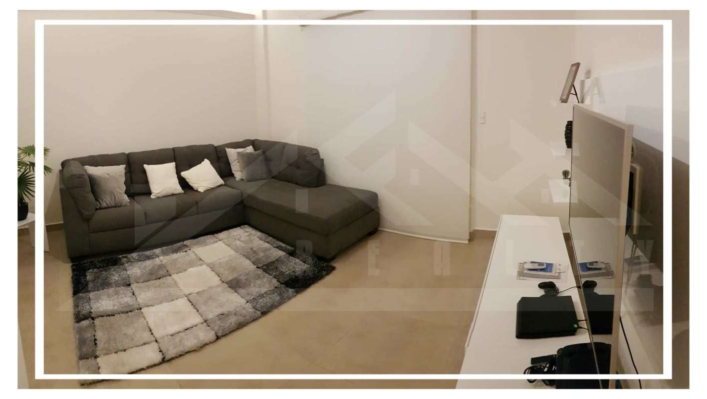 Elegant living room area in Embassy Club Clayton Panama apartment for rent