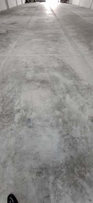 Empty warehouse space with polished concrete floor high ceiling Las Mañanitas Panama