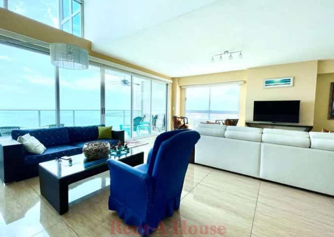 Panoramic oceanfront balcony with glass railing view PH Yacht Club Residences Panama