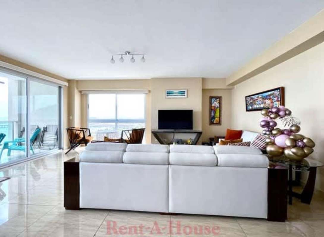 Bedroom suite with panoramic window ocean and skyline views PH Yacht Club Residences Panama