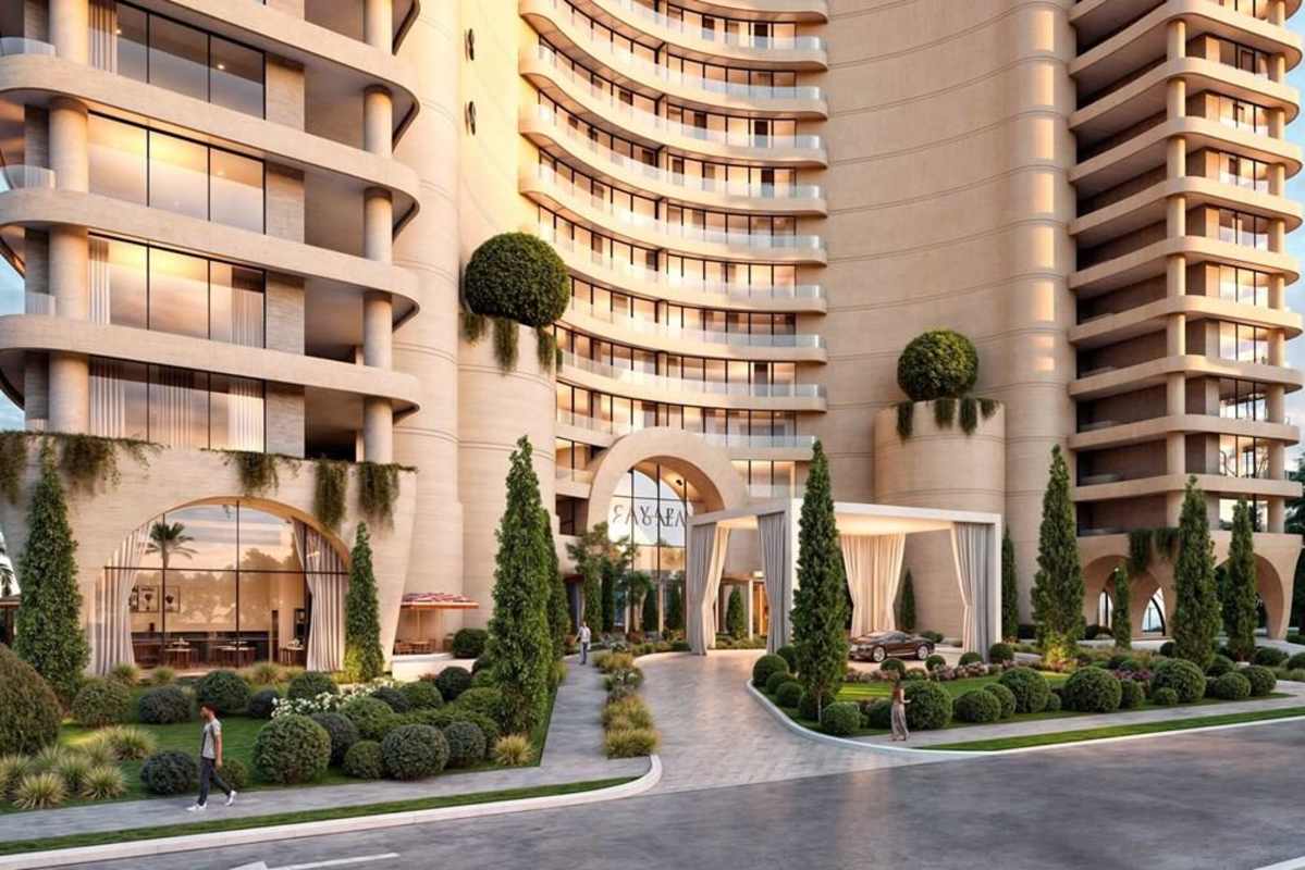 Rooftop infinity swimming pool with view of canal entrance and city skyline Panama