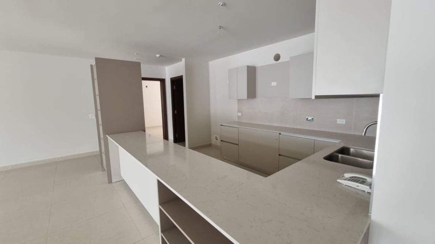 Contemporary kitchen with quartz countertops, high-end cabinetry at PH Costa del Este Exclusive Panama